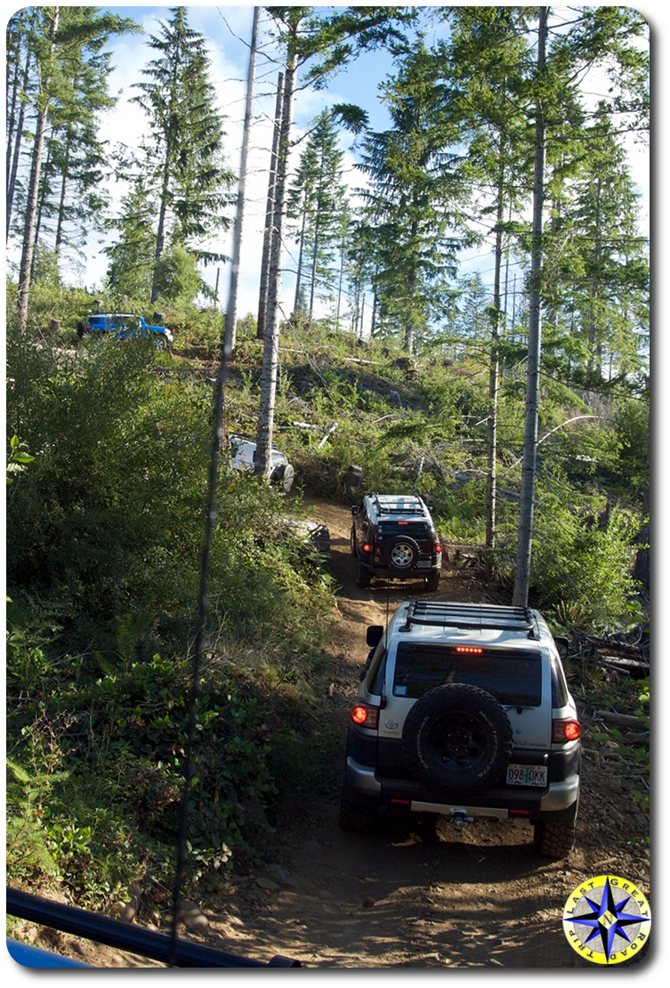 toyota fj cruiser climbing through woods