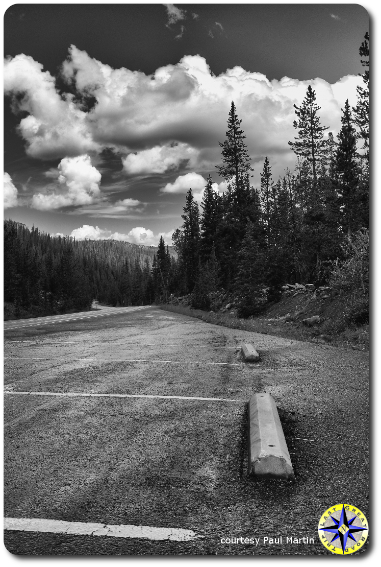 Storm clouds over utah mountain rest stop parkin lot